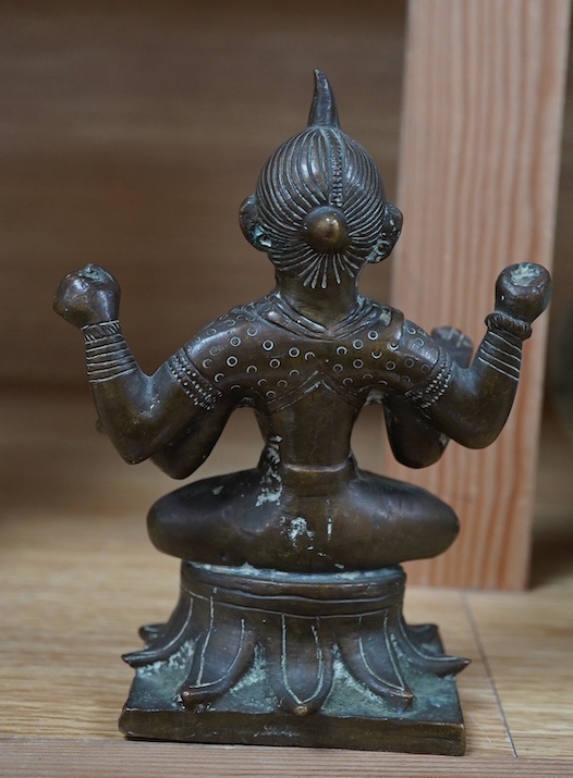 An Indian bronze tantric figure, 14cm high. Condition - fair to good